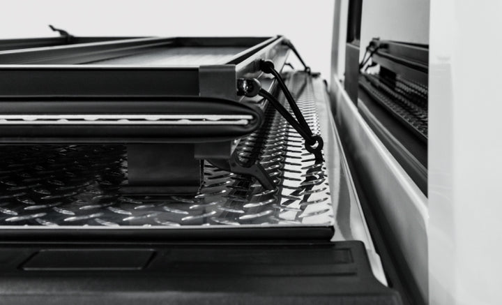 Access LOMAX Tri-Fold Cover Black Urethane Finish 04+ Ford F-150 - 5ft 6in Bed - Bull Strap
