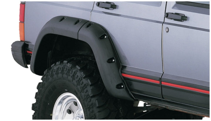 Bushwacker 84-01 Jeep Cherokee Cutout Style Flares 4pc Fits 4-Door Sport Utility Only - Black - Bull Strap