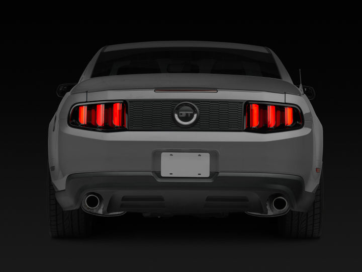 Raxiom 10-12 Ford Mustang Vector V2 LED Tail Lights - Gloss Black Housing (Clear Lens) - Bull Strap