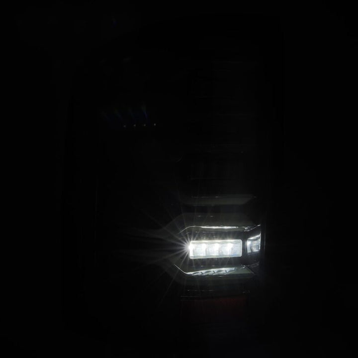 AlphaRex 14-18 GMC Sierra 1500/2500HD/3500HD LUXX-Series LED Tail Lights Alpha-Blk Actv Lgt Seq. Sig - Bull Strap