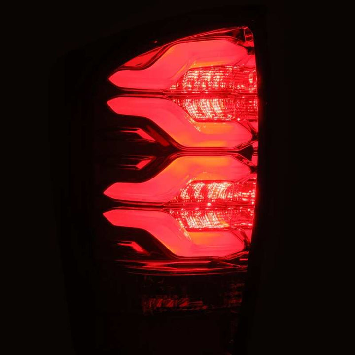 AlphaRex 16-21 Toyota Tacoma LUXX LED Taillights Blk/Red w/Activ Light/Seq Signal - Bull Strap