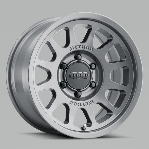 Method MR703 17x7.5 +50mm Offset 6x130 84.1mm CB Gloss Titanium Wheel - Bull Strap