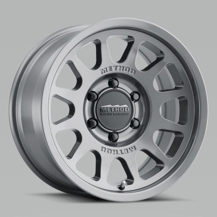 Method MR703 17x7.5 +50mm Offset 6x130 84.1mm CB Gloss Titanium Wheel - Bull Strap