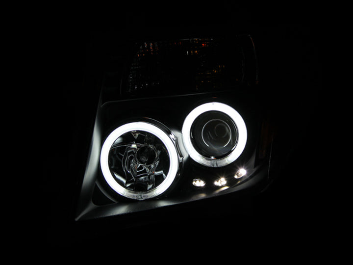 ANZO 2005-2008 Nissan Frontier Projector Headlights w/ Halo Black - Bull Strap