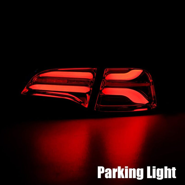 AlphaRex 20-22 Tesla Model Y PRO-Series LED Tail Lights Jet Black w/Seq Sig - Bull Strap