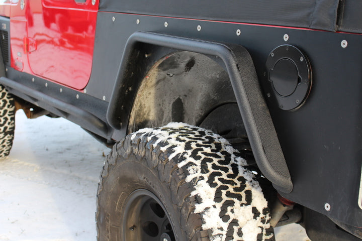 Fishbone Offroad 97-06 Jeep Wrangler TJ Steel Tube Fenders Front 3In Flare - Blk Textured Powdercoat - Bull Strap