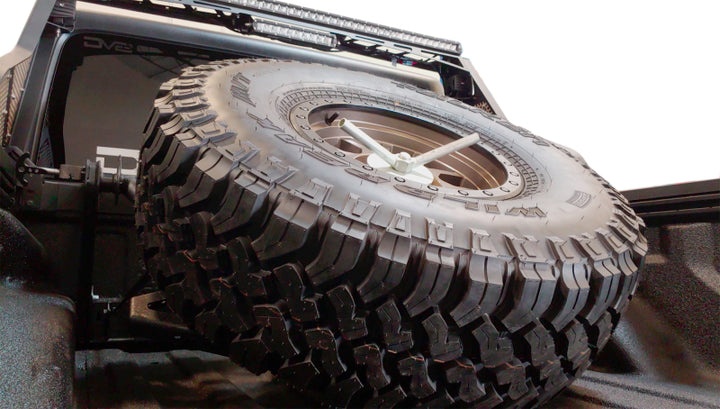 DV8 Offroad 2019+ Jeep Gladiator In-Bed Adjustable Tire Carrier - Bull Strap