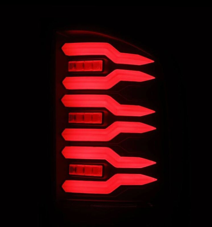 AlphaRex 07-14 Chevrolet Silverado 1500/2500HD/3500HD Luxx-Series LED Tail Lights Blk w/Smoked Lens - Bull Strap
