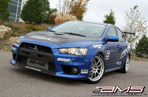 AMS Performance 08-15 Mitsubishi EVO X Front Mount Intercooler w/Modular Cast End Tanks & Logo - Bull Strap