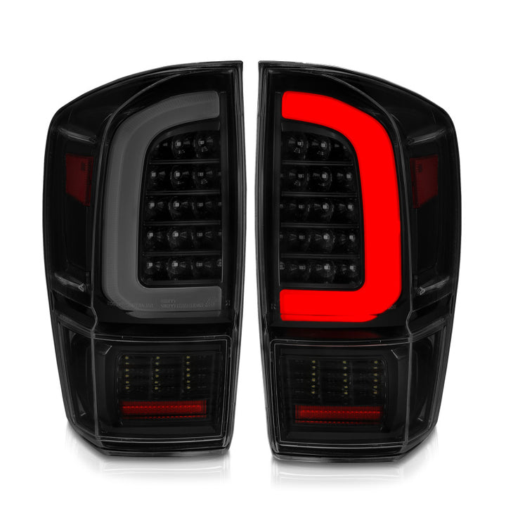 ANZO 16-21 Toyota Tacoma LED Tail Lights - w/ Light Bar Sequential Black Housing & Smoke Lens - Bull Strap