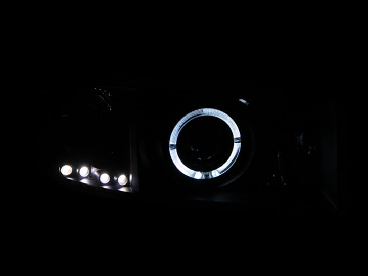 ANZO 1994-2001 Dodge Ram Projector Headlights w/ Halo Black - Bull Strap