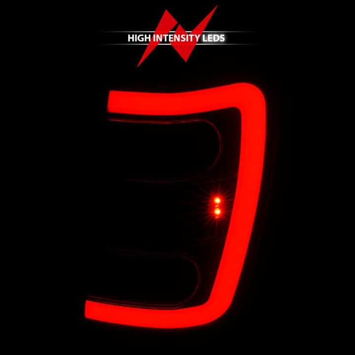 ANZO 1999-2004 Jeep Grand Cherokee LED Tail Lights w/ Light Bar Black Housing Smoke Lens - Bull Strap