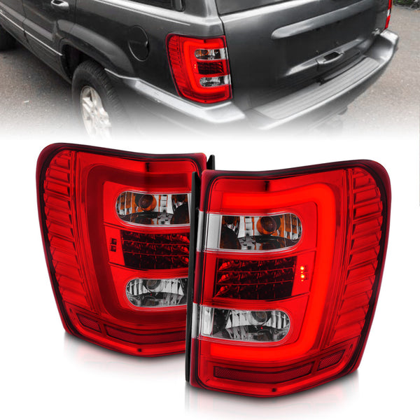 ANZO 1999-2004 Jeep Grand Cherokee LED Tail Lights w/ Light Bar Chrome Housing Red/Clear Lens - Bull Strap