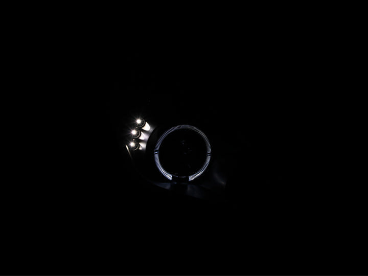 ANZO 2000-2005 Toyota Celica Projector Headlights w/ Halo Black - Bull Strap