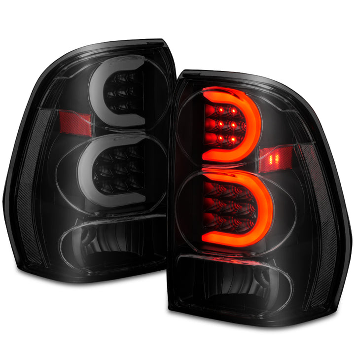 ANZO 2002-2009 Chevrolet Trailblazer LED Tail Lights w/ Light Bar Black Housing Smoke Lens - Bull Strap