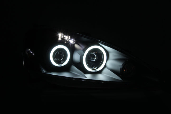 ANZO 2005-2006 Acura RSX Projector Headlights w/ Halo Black - Bull Strap