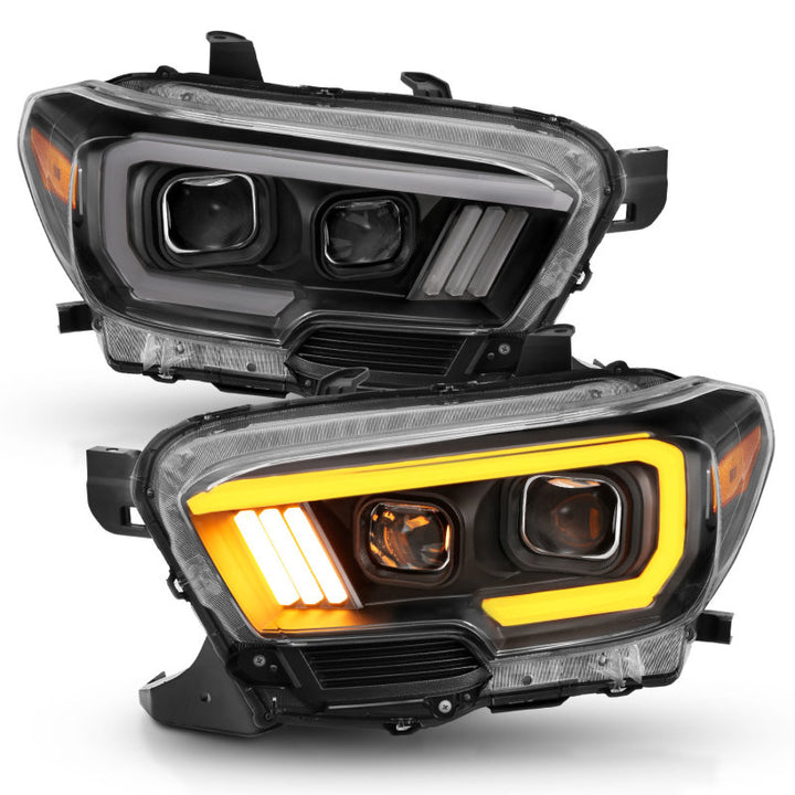 ANZO 2016-2017 Toyota Tacoma Projector Headlights w/ Plank Style Switchback Black w/ Amber w/ DRL - Bull Strap