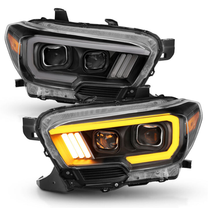 ANZO 2016-2017 Toyota Tacoma Projector Headlights w/ Plank Style Switchback Black w/ Amber w/ DRL - Bull Strap
