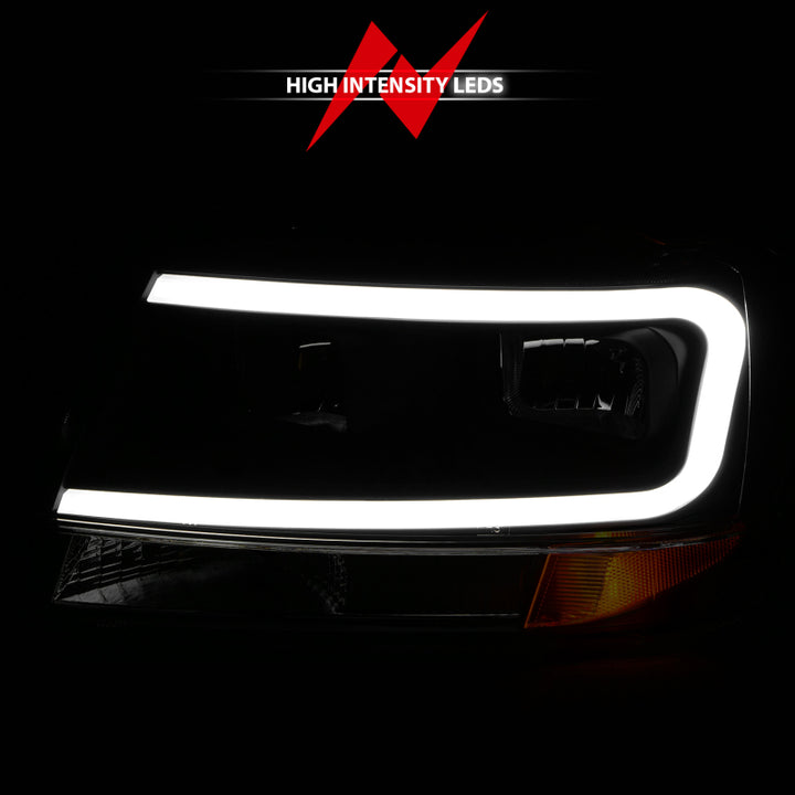 ANZO 99-04 Jeep Grand Cherokee Crystal Headlights - w/ Light Bar Black Housing - Bull Strap