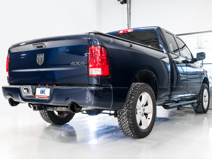 AWE Tuning 09-18 RAM 1500 5.7L (w/Cutouts) 0FG Dual Rear Exit Cat-Back Exhaust - Diamond Black Tips - Bull Strap