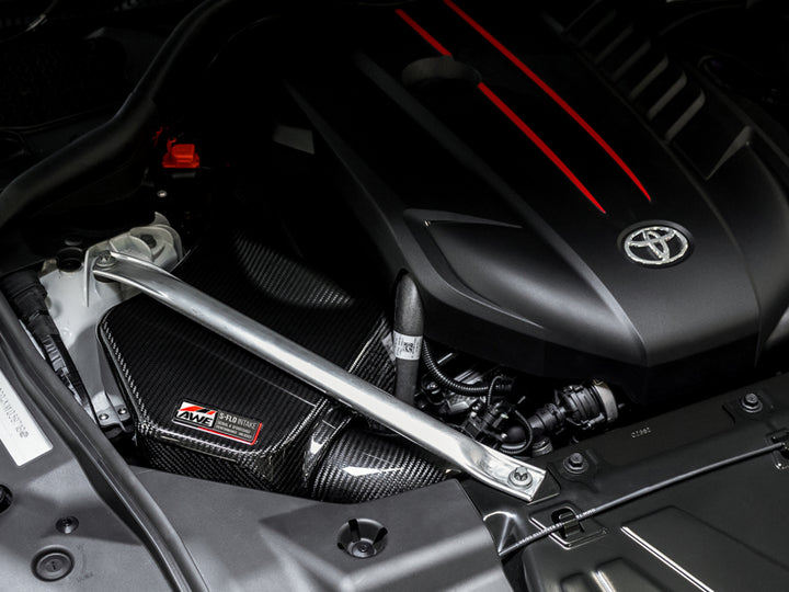 AWE Tuning 2020+ Toyota GR Supra S-FLO Carbon Intake Lid - Bull Strap