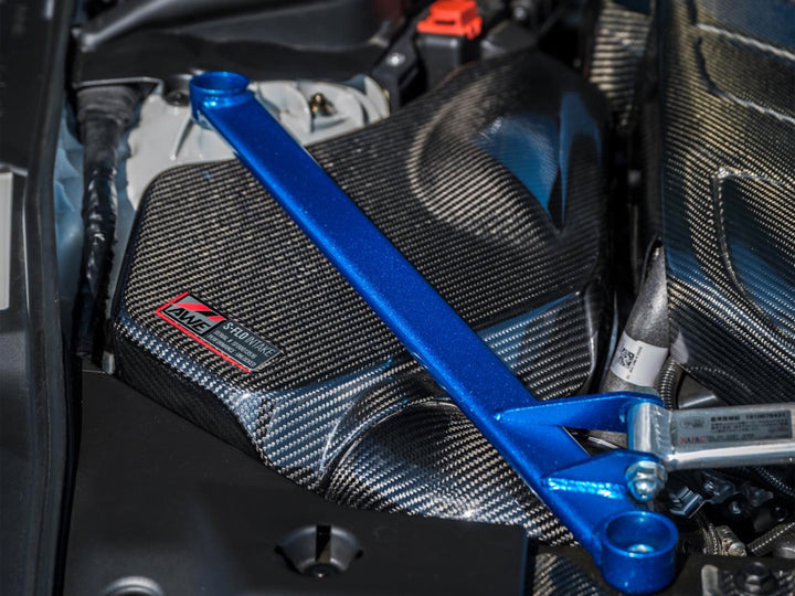 AWE Tuning 2020+ Toyota GR Supra S-FLO Carbon Intake Lid - Bull Strap