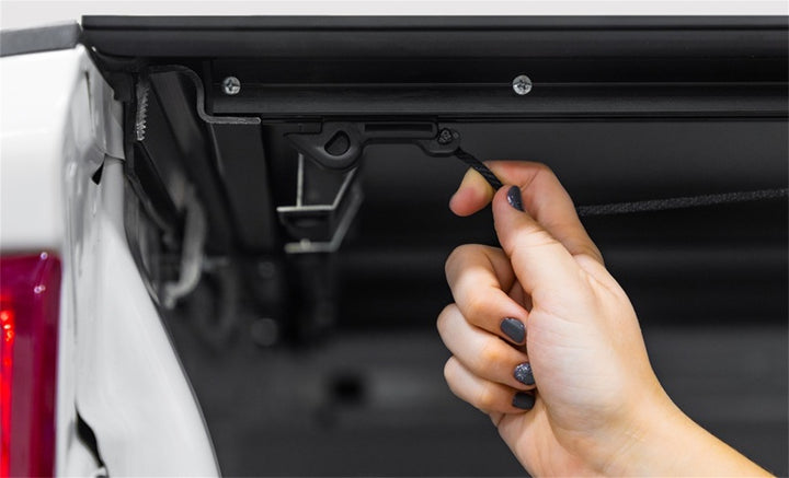 Access LOMAX Tri-Fold Cover Black Urethane Finish 19+ Chevrolet Silverado 1500 - 5ft 8in Bed - Bull Strap