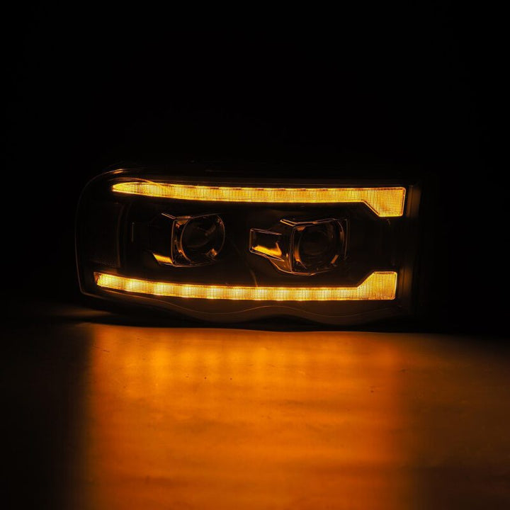 AlphaRex 02-05 Dodge Ram 1500 LUXX LED Proj Headlights Plank Style Black w/Activ Light/Seq Signal - Bull Strap