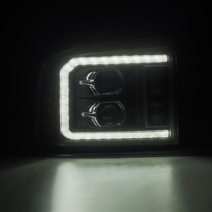AlphaRex 05-07 Ford F250/350/450/550 Super Duty LUXX LED Proj HL Blk w/Actv Light & Seq Sig + SB DRL - Bull Strap