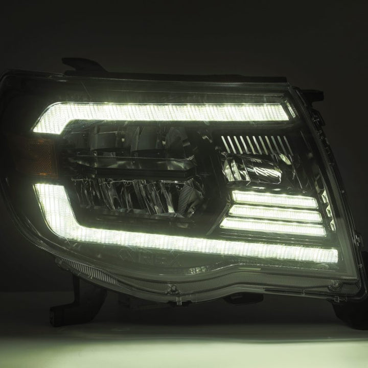 AlphaRex 05-11 Toyota Tacoma LUXX Crystal Headlights Plank Style Alpha Black w/Activation Light/DRL - Bull Strap
