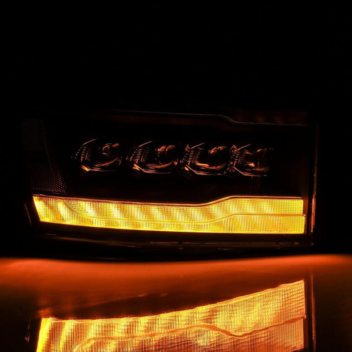 AlphaRex 06-08 Dodge Ram 1500HD NOVA LED ProjHeadlights Plank Style Blk w/Seq Signal/DRL/Amber LED - Bull Strap