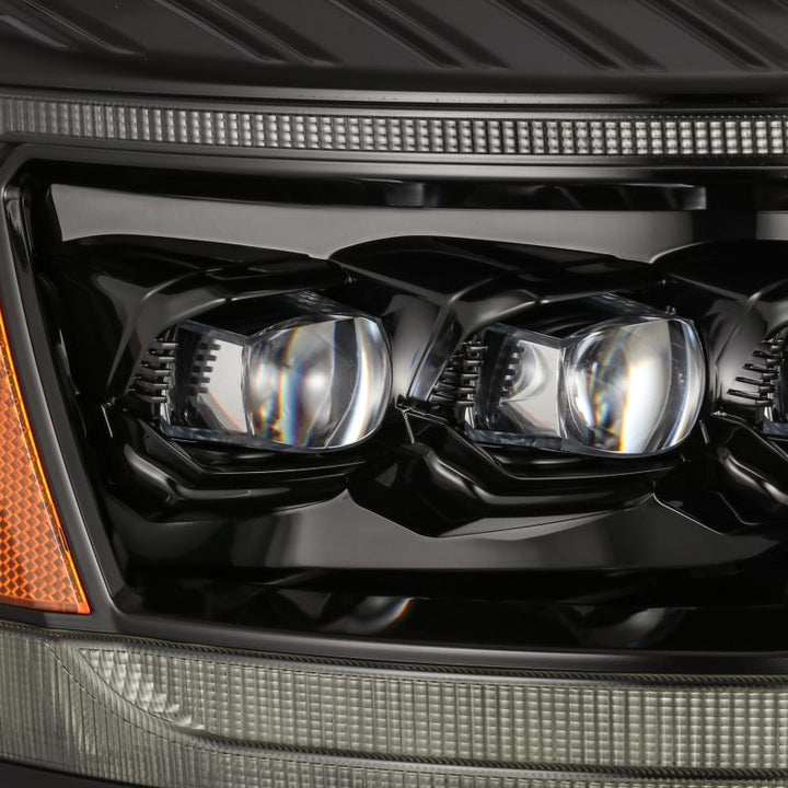 AlphaRex 06-08 Ram 1500HD NOVA LED Proj Headlights Plank Style Alpha Blk w/Seq Signal/DRL/Amber LED - Bull Strap