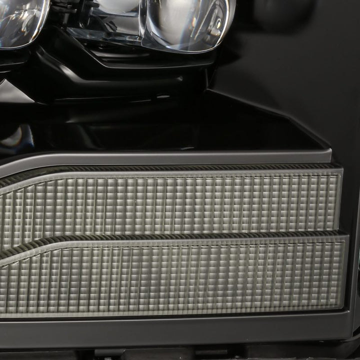 AlphaRex 06-08 Ram 1500HD NOVA LED Proj Headlights Plank Style Alpha Blk w/Seq Signal/DRL/Amber LED - Bull Strap