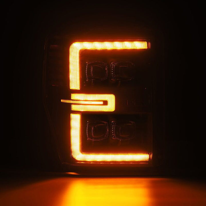 AlphaRex 08-10 Ford F250-550 NOVA-Series LED Projector Headlights Black w/Activ Light/Seq Signal - Bull Strap