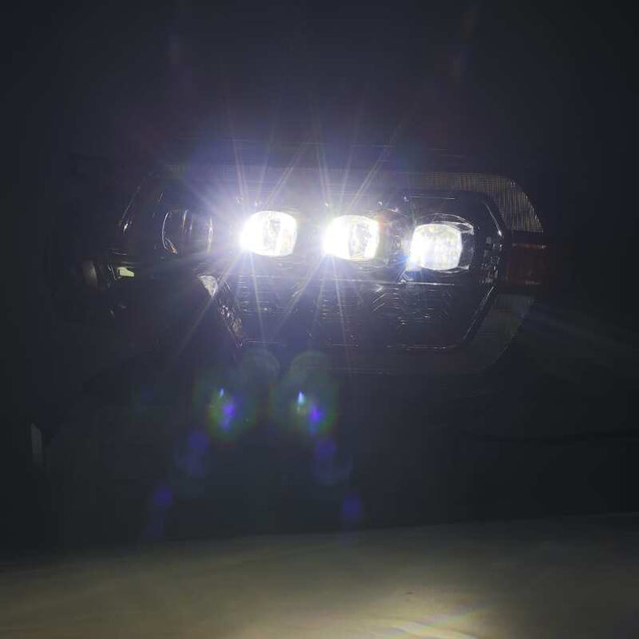 AlphaRex 12-15 Toyota Tacoma NOVA LED Proj Headlights Plank Style Black w/Activ Light/Seq Signal/DRL - Bull Strap