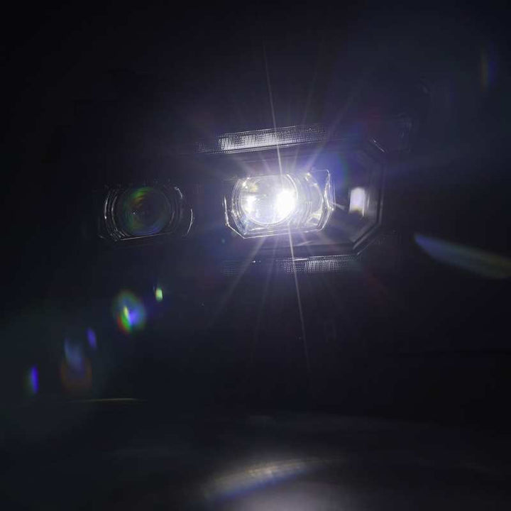 AlphaRex 19-21 Ram 2500 LUXX LED Proj Headlights Plank Style Black w/Activ Light/Seq Signal/DRL - Bull Strap