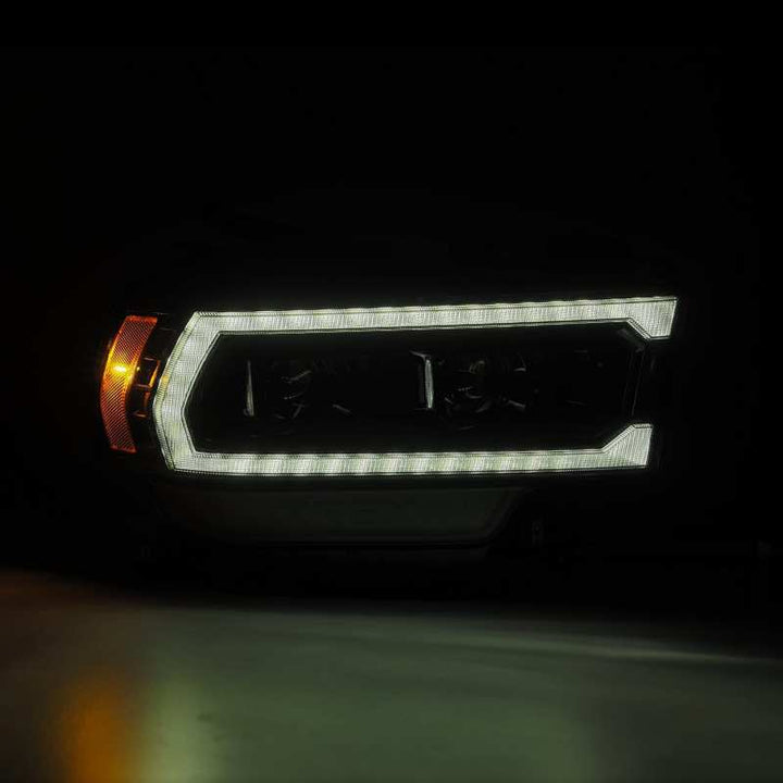 AlphaRex 19-21 Ram 2500 PRO-Series Projector Headlights Plank Style Alpha Black w/Activation Light - Bull Strap
