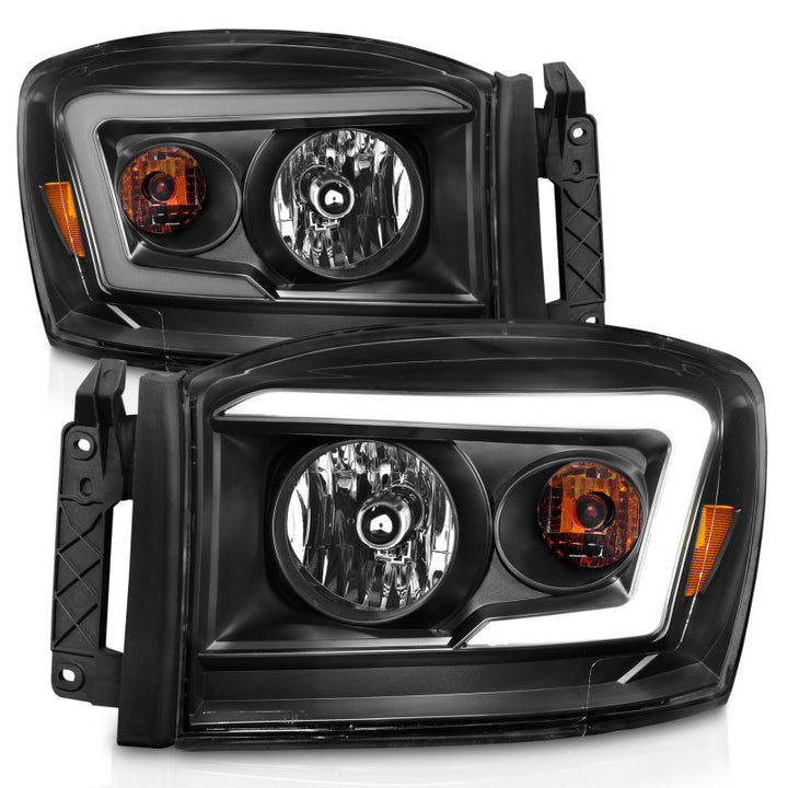 ANZO 06-09 Dodge RAM 1500/2500/3500 Headlights Black Housing/Clear Lens (w/ Light Bars) - Bull Strap