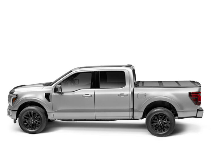 BAK 05-20 Nissan Frontier 5ft Bed BAKFlip MX4 Matte Finish - Bull Strap