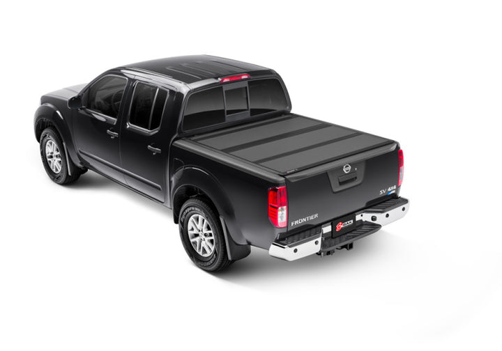 BAK 05-20 Nissan Frontier 5ft Bed BAKFlip MX4 Matte Finish - Bull Strap