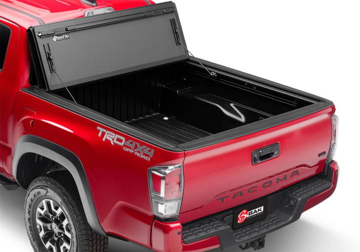 BAK 16-20 Toyota Tacoma 5ft Bed BAKFlip MX4 Matte Finish - Bull Strap