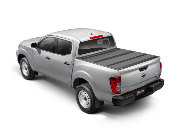 BAK 2022 Nissan Frontier 5ft Bed BAKFlip MX4 Matte Finish - Bull Strap