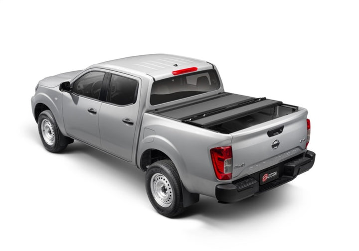 BAK 2022 Nissan Frontier 5ft Bed BAKFlip MX4 Matte Finish - Bull Strap