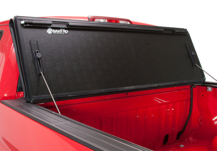 BAK 2024 Toyota Tacoma 5ft Bed BAKFlip Fibermax Bed Cover - Bull Strap