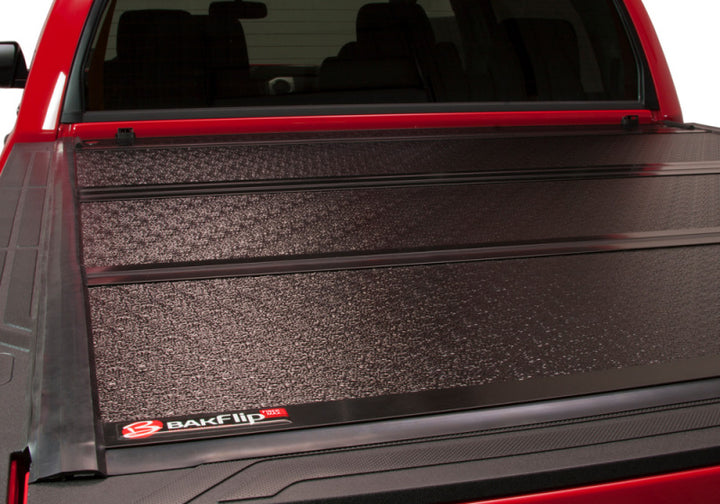 BAK 2024 Toyota Tacoma 5ft Bed BAKFlip Fibermax Bed Cover - Bull Strap
