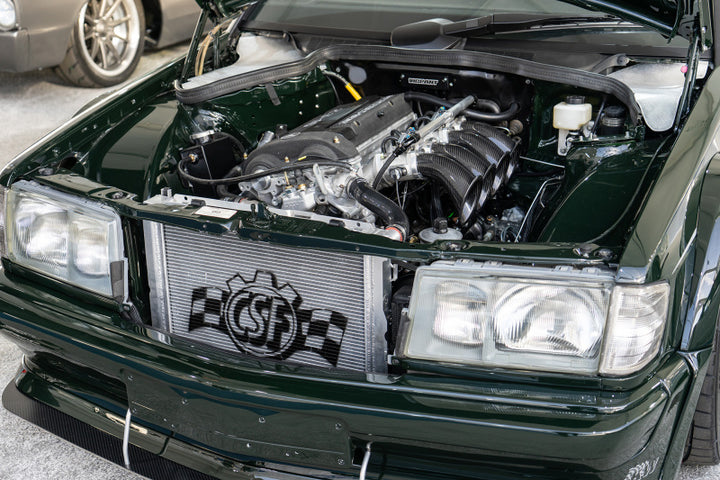 CSF 84-88 Mercedes-Benz W201 190E 2.3L - 16 w/ A/C High Performance Aluminum Radiator - Bull Strap