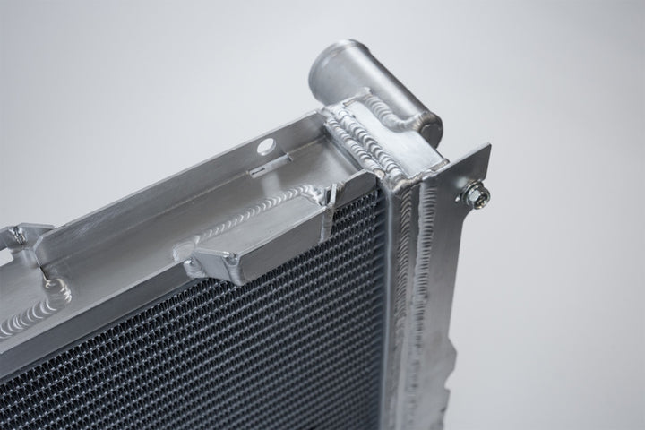 CSF 84-88 Mercedes-Benz W201 190E 2.3L - 16 w/ A/C High Performance Aluminum Radiator - Bull Strap