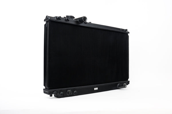 CSF 93-98 Toyota MK4 Supra Radiator - Black Finish - Bull Strap