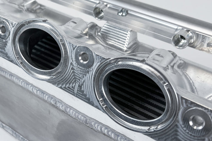 CSF Gen 2 B58 Race X Charge-Air-Cooler Manifold - Raw Billet Aluminum Finish - Bull Strap