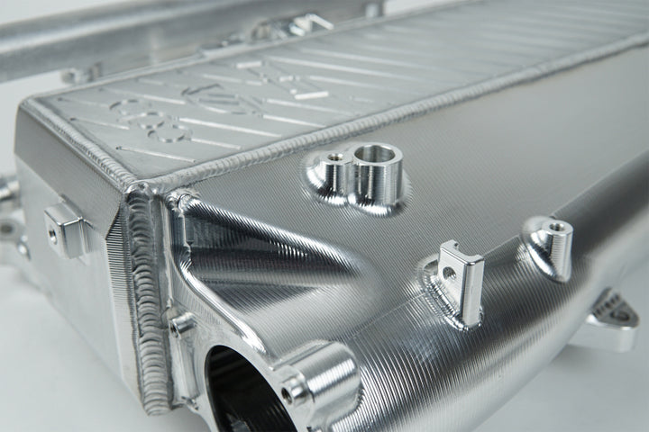 CSF Toyota A90/A91 Supra/ BMW G-Series B58 Charge-Air Cooler Manifold- Machined Billet Aluminum - Bull Strap